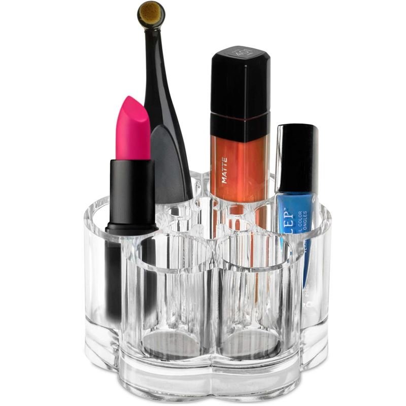 UNIQ Blomster Makeup Akryl Organizer | U301 fra UNIQ er en smart læbestiftholder, der holder pink læbestift, en sort makeup-pensel, orange lipgloss og blå neglelak pænt arrangeret i separate rum.