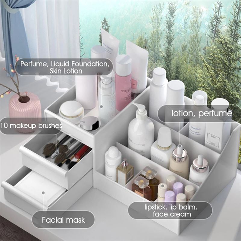 UNIQ Kosmetik Organizer | P110 | Hvid by UNIQ opbevarer lotion, parfume, foundation og hudpleje med mærkede sektioner til børster, masker, læbestift, læbepomade og ansigtscreme - smukt udstillet på en vindueskarm med udsigt til skoven.