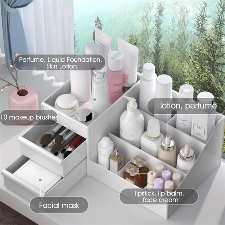 UNIQ Kosmetik Organizer | P110 | Hvid by UNIQ opbevarer lotion, parfume, foundation og hudpleje med mærkede sektioner til børster, masker, læbestift, læbepomade og ansigtscreme - smukt udstillet på en vindueskarm med udsigt til skoven.