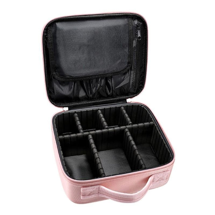 UNIQ Rejsetoilettaske / Kosmetiktaske til alt dit Makeup | Pink har et håndtag, lynlåslukning, justerbare sorte skillevægge og elastiske lommer - ideel til organisering af makeup, kosmetik eller tilbehør fra mærket UNIQ.