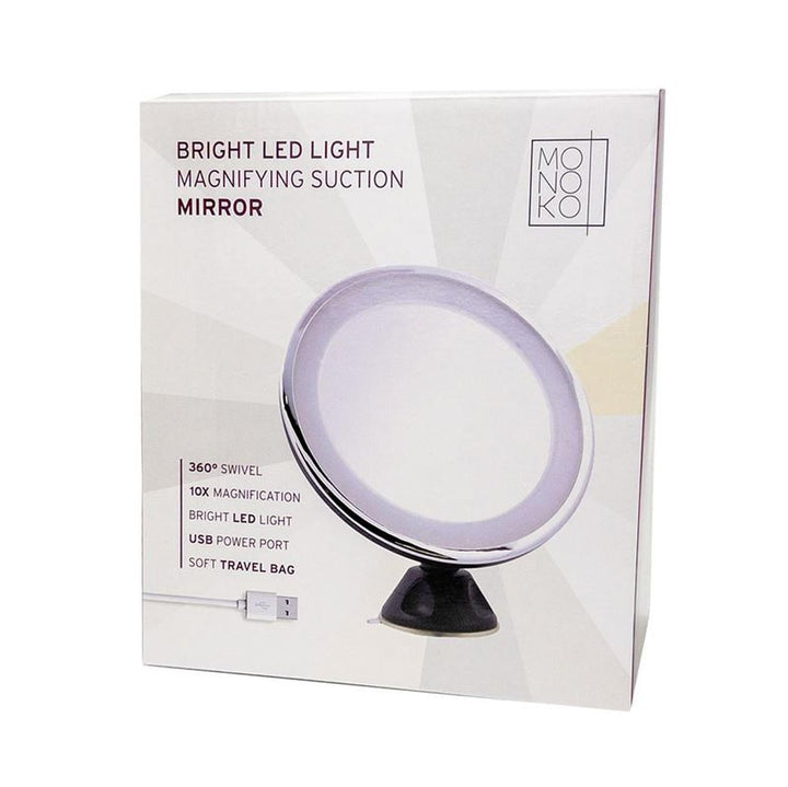 En æske med et UNIQ makeupspejl med LED-lys, sugekop, x10-forstørrelse, i hvid, plus en rejsepose; forsiden viser et billede af UNIQ Rundt Spejl med LED Lys.