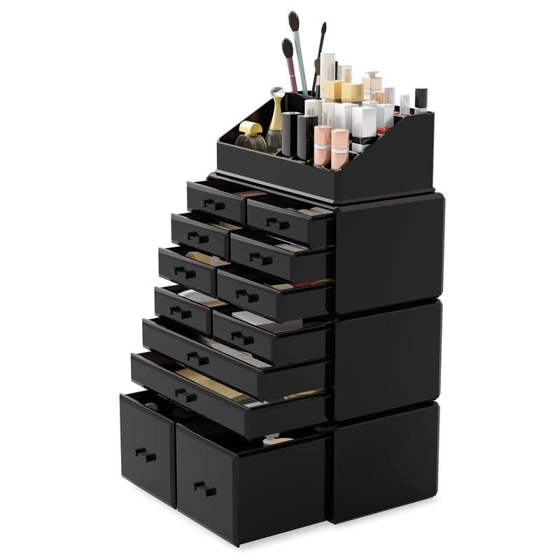 UNIQ XXL Organizer med 12 skuffer og 16 rum i sort fra UNIQ har plads til kosmetik, børster og flasker på toppen samt skuffer nedenunder til ekstra makeup-opbevaring.
