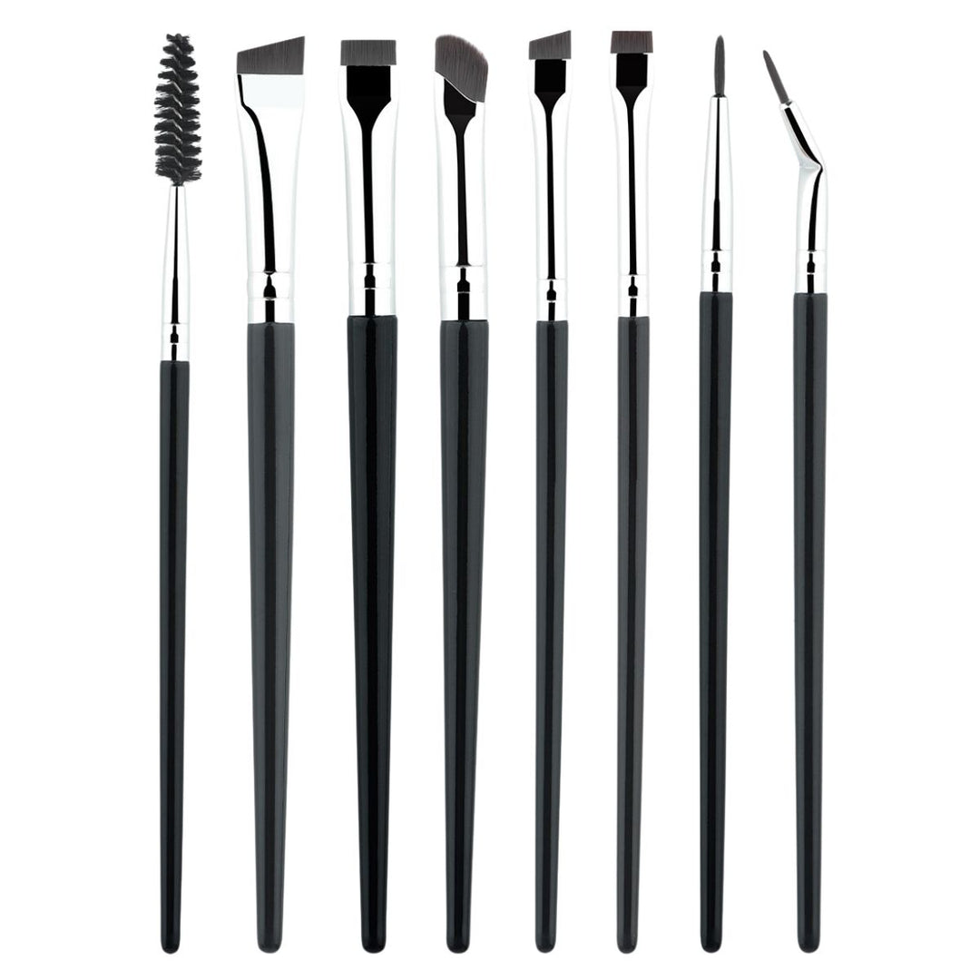 Technique PRO Brow & Liner Artist Set - 8 stk fra Technique PRO indeholder otte børster med sort skaft og sølvhylster - vinklede, flade og spoolie - pænt arrangeret på række mod en hvid baggrund.